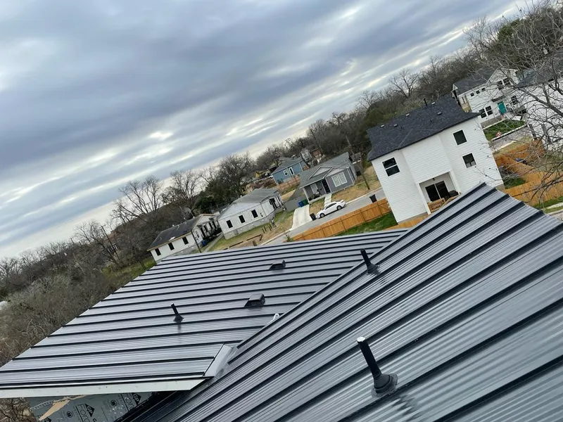 Standing seam metal roof panels with vents for Skylight Repair in Bartonville